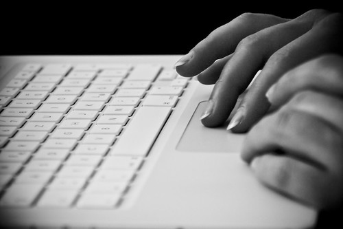 Person typing on a laptop